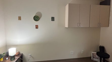 Calm room at Mindful Movements with Meghan in Marion, Ohio, US with soft lighting and minimalist decor.