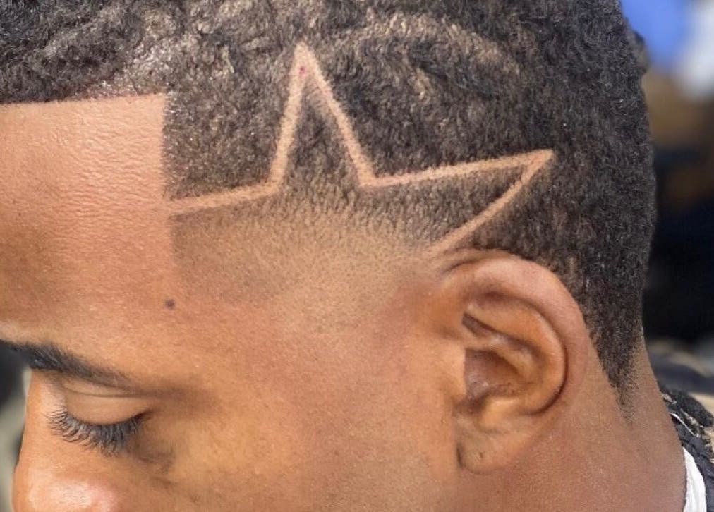 Diseño de estrella en corte de cabello en Víctor style, Santo Domingo, Distrito Nacional, DO.
