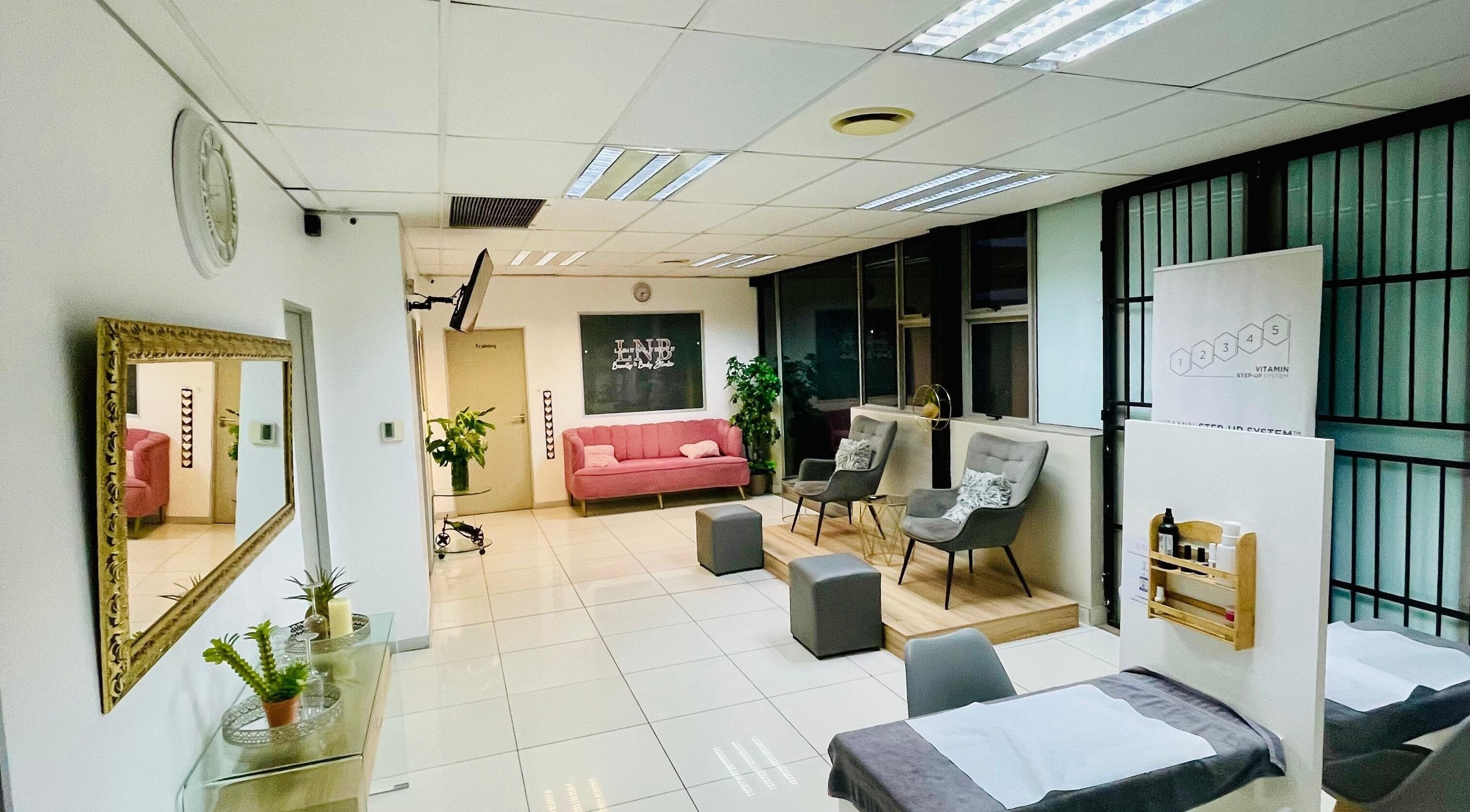 Elegant interior of Lash It Nail It Brow It (LNB Beauty Salon&Hair) in Randburg, Gauteng, ZA with modern seating.