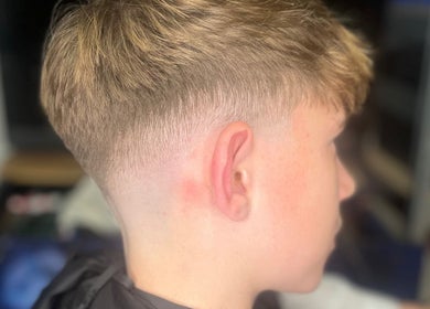 Fade haircut at CH Hair in Belfast, Northern Ireland, GB, showcasing expert styling and precision.