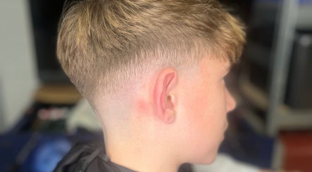 Fade haircut at CH Hair in Belfast, Northern Ireland, GB, showcasing expert styling and precision.
