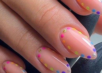 Vibrant nail art with colorful dots at BB, GB enhancing elegant nail style.