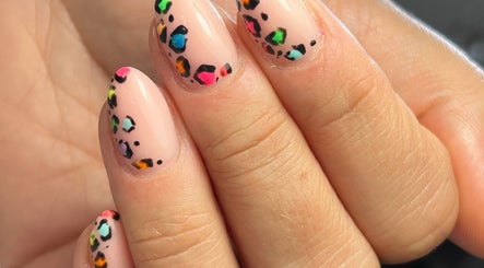 Colorful leopard nail design at BB in GB, showcasing vibrant and trendy nail art.