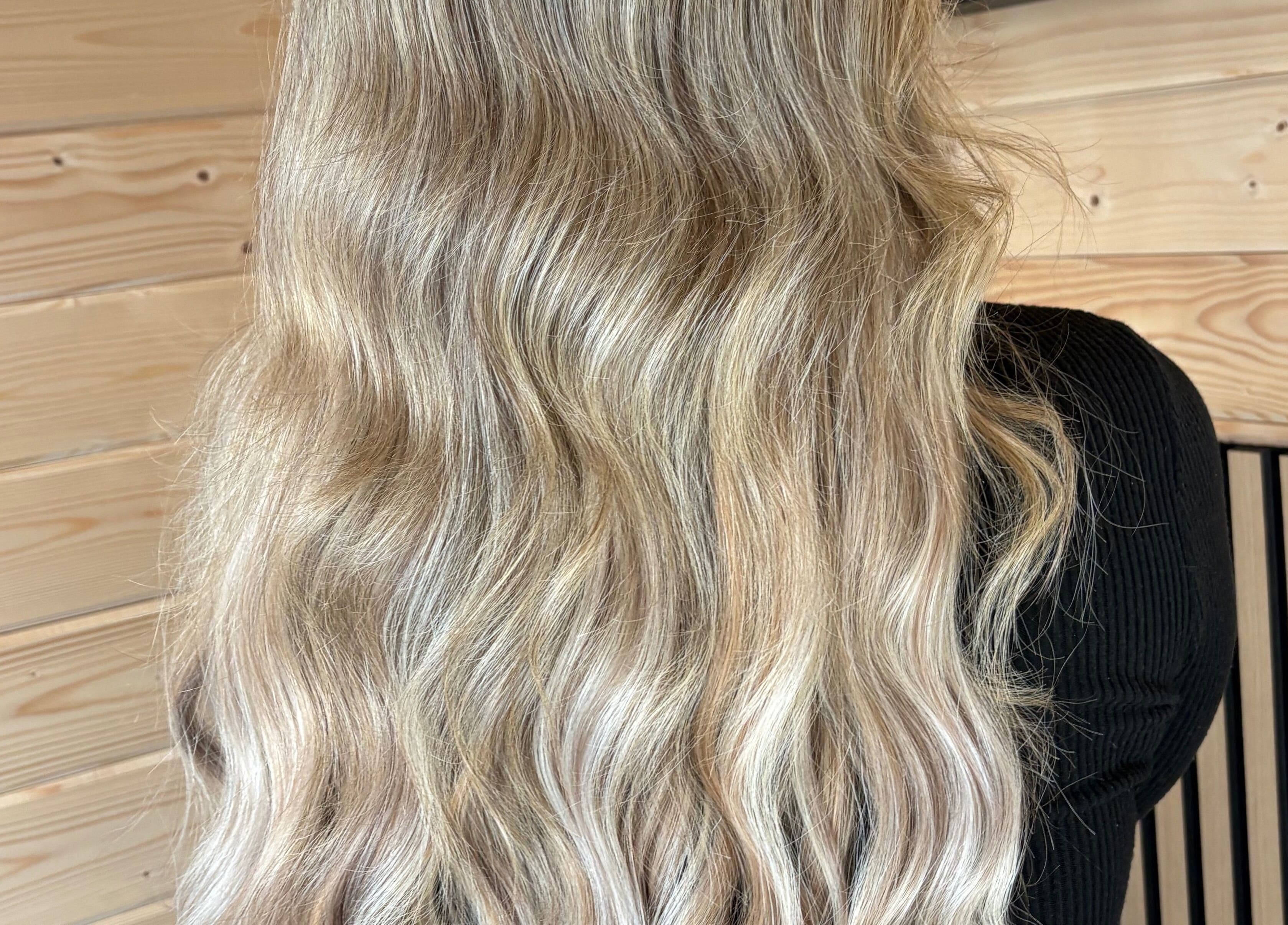 Blonde wavy hair styled at Revive Hair And Beauty Studio, Aberdeen, Scotland, GB.