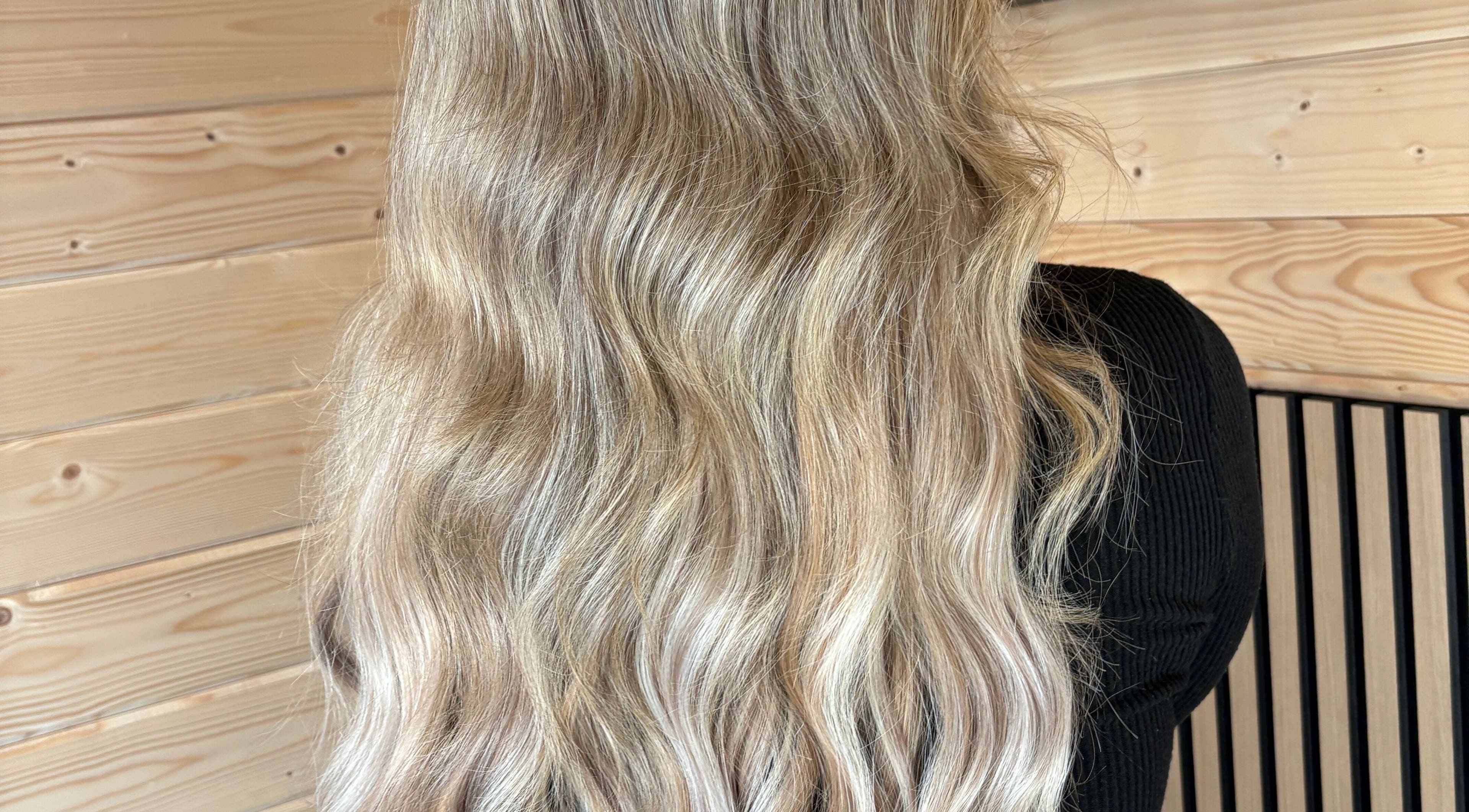 Blonde wavy hair styled at Revive Hair And Beauty Studio, Aberdeen, Scotland, GB.