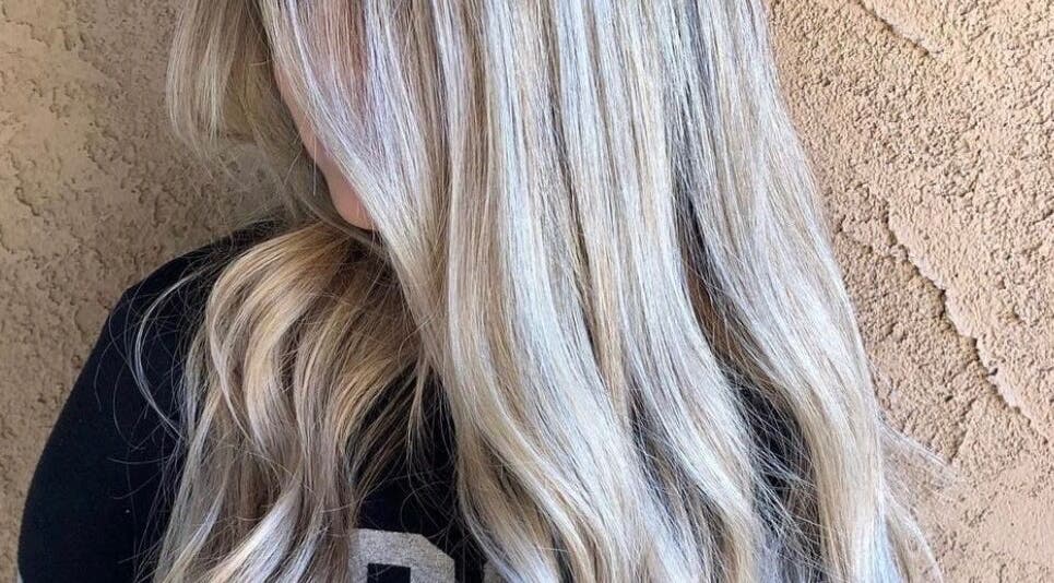 Blonde hair styled in smooth waves at Glaze Studios, Oxnard, California, US.