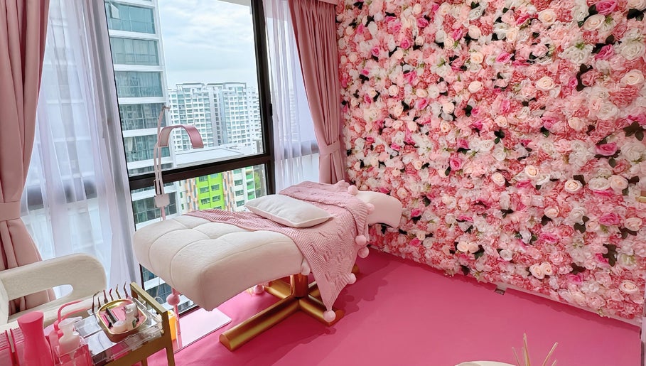 Luxurious massage room with pink floral decor at Beauty Oasis, Singapore, Singapore, SG.