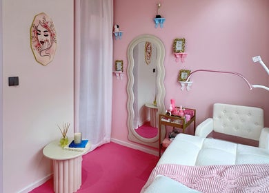 Chic beauty room with pink decor at Beauty Oasis, Singapore, SG, featuring elegant styling and relaxing ambiance.