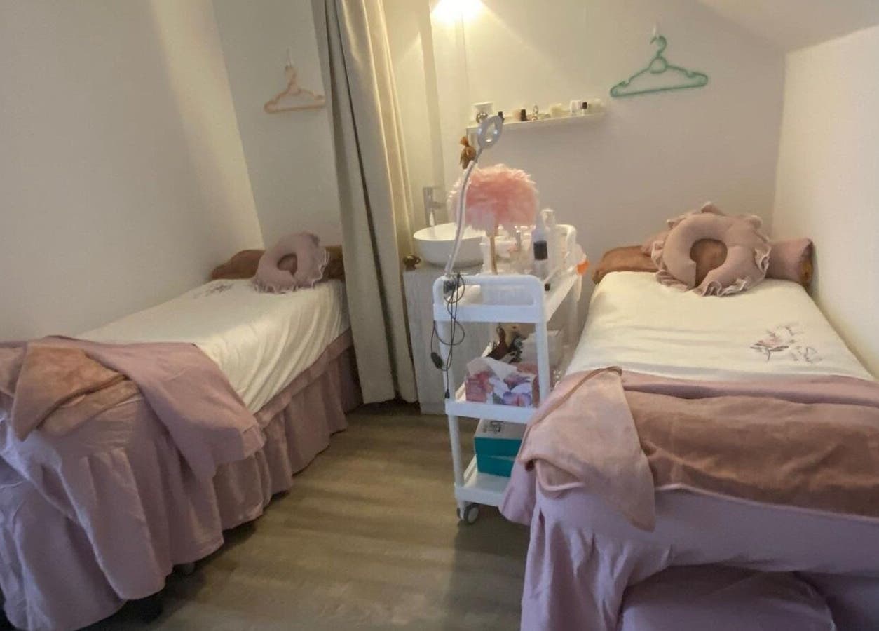 Tranquil treatment room at Fannel De Beaute, Singapore, SG, featuring two cozy beds for ultimate relaxation.