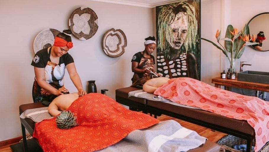 Therapists provide massages at Touch by Africa Zevenwacht, Cape Town, Western Cape, ZA in a soothing ambiance.