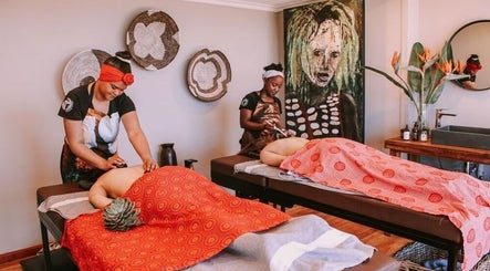 Therapists provide massages at Touch by Africa Zevenwacht, Cape Town, Western Cape, ZA in a soothing ambiance.