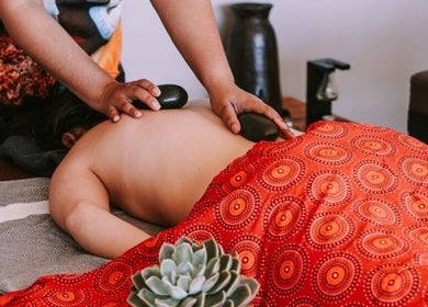 Relaxing hot stone massage at Touch by Africa Zevenwacht, Cape Town, Western Cape, ZA.