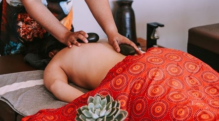 Relaxing hot stone massage at Touch by Africa Zevenwacht, Cape Town, Western Cape, ZA.