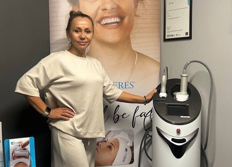 Expert at Harmony Beauty Studio in Arklow, County Wicklow, IE, showcasing advanced skincare equipment.