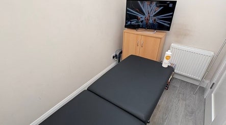 Relaxing therapy room with massage table at Lynam Performance & Recovery, Dublin, County Dublin, IE.