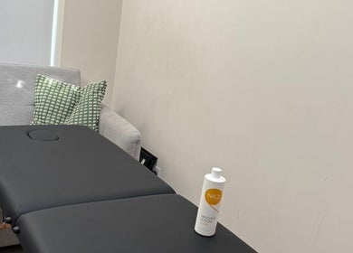 Lynam Performance & Recovery massage table in Dublin, County Dublin, IE, with cushion and lotion.