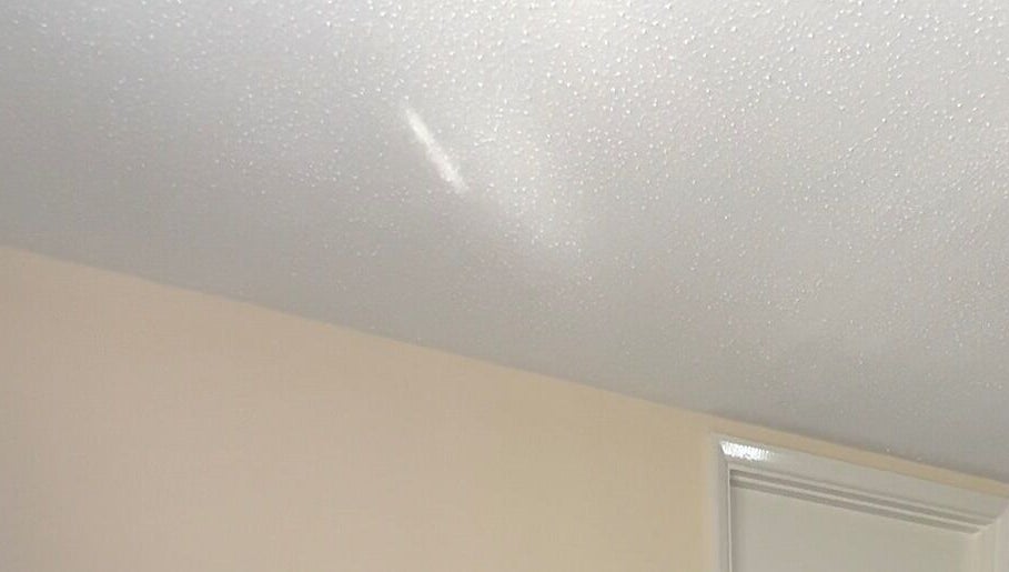 Smooth ceiling detail at BRAIDS by MJ, Maidstone, England, GB, showcasing a serene ambiance.