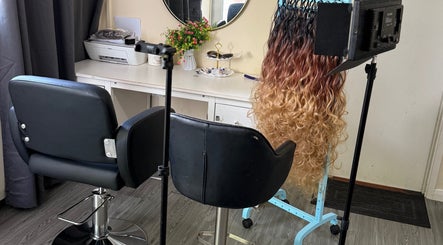 BRAIDS by MJ salon in Maidstone, England, showcasing professional styling setup and equipment.