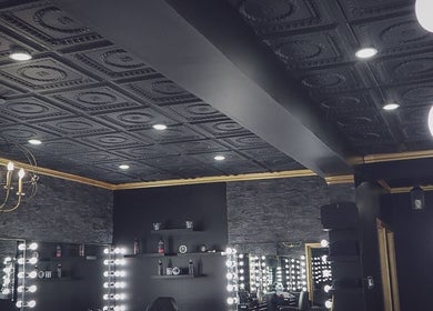 Chic salon interior at Newav Brossard, featuring vintage-style lights, Brossard, Québec, CA.