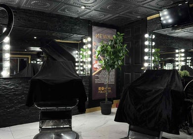 Chic salon setup with lighted mirrors at Newav Brossard, Brossard, Québec, CA. Modern and inviting atmosphere.