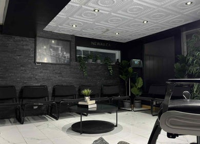 Chic waiting area at Newav Brossard in Brossard, Québec, CA with elegant seating and modern decor.
