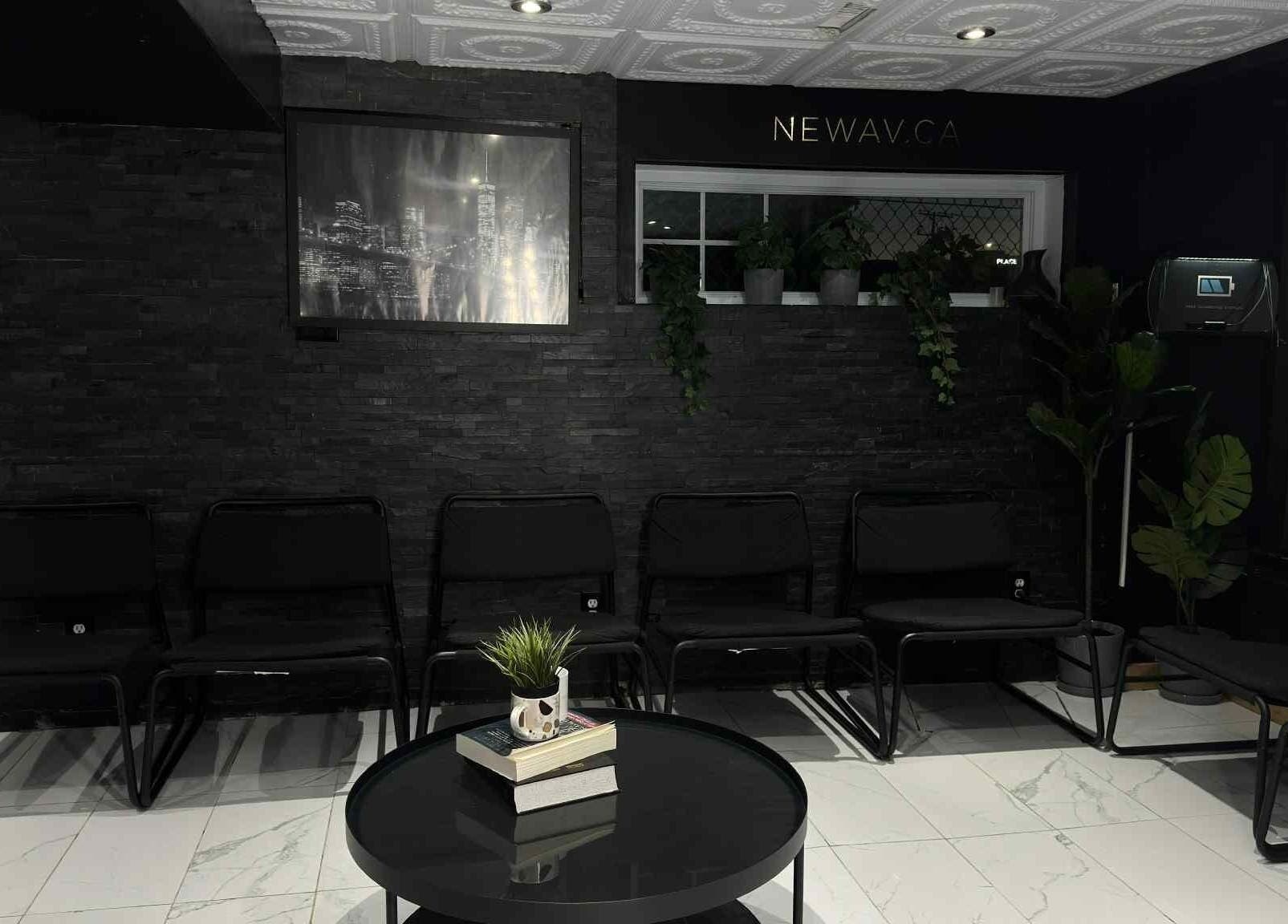 Elegant seating area at Newav Brossard, Brossard, Québec, CA, featuring modern chairs and decor.