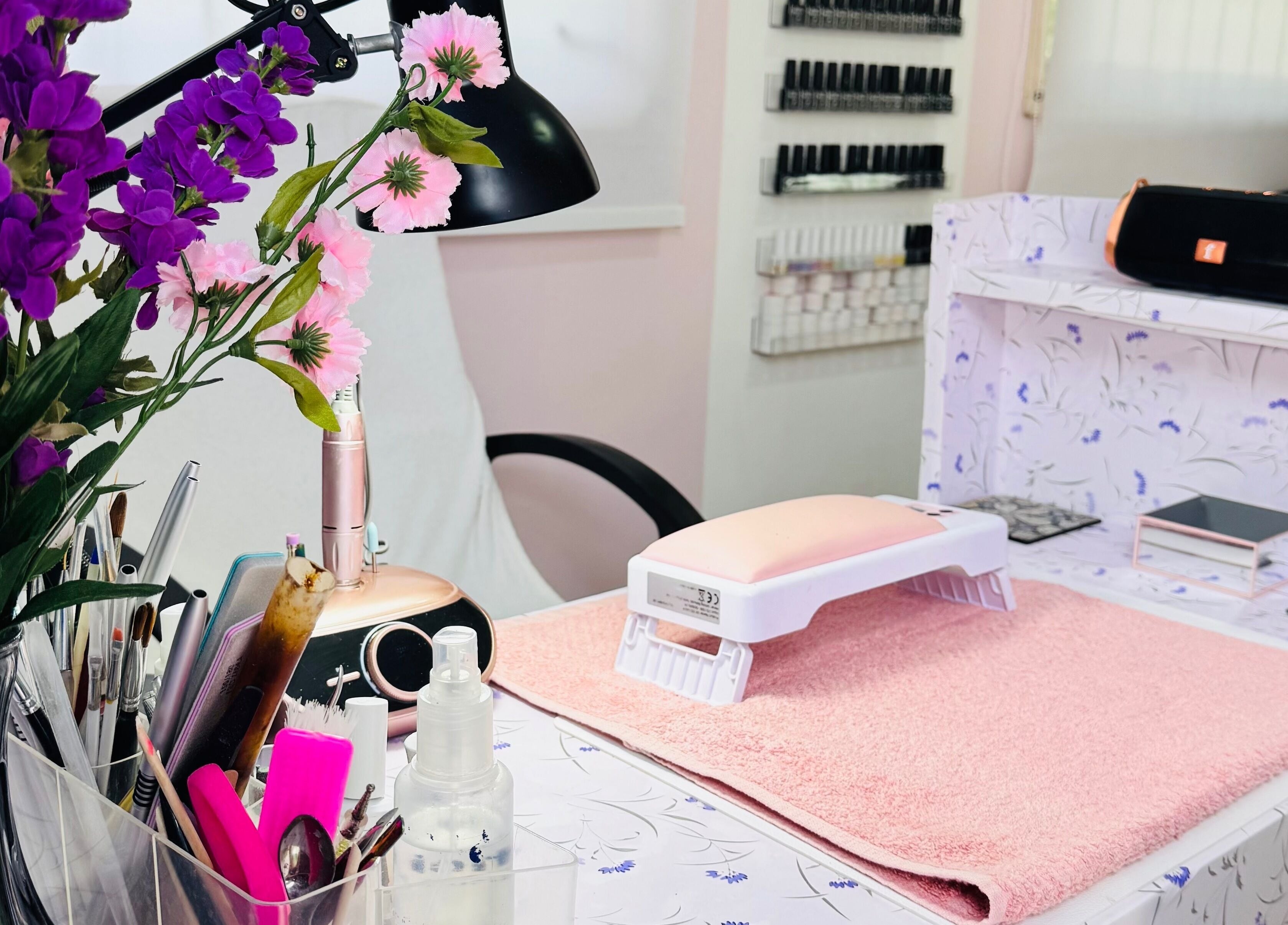 Elegant Touch By Lia's Nails in Willemstad, Curaçao features a chic floral manicure station.