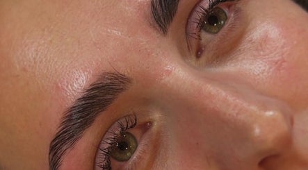 Close-up of enhanced eyebrows and eyes at Queen Bee Beauty Enhancement in Donington, England, GB.