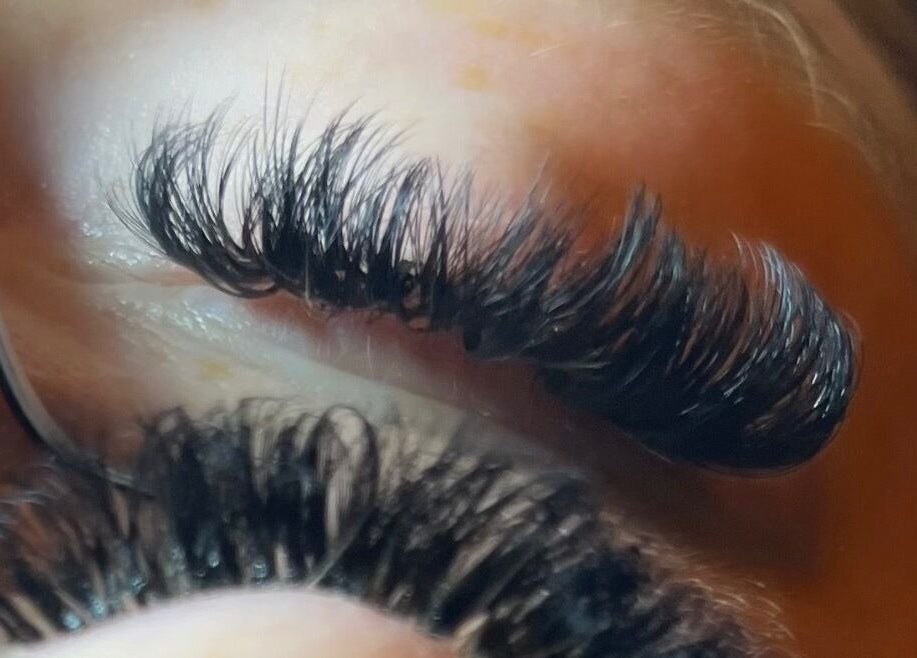 Close-up of expertly applied eyelash extensions at V&A Lashes, Portsmouth, England, GB.