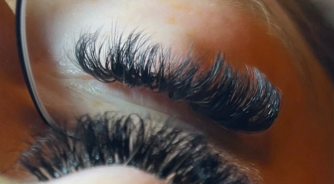 Close-up of expertly applied eyelash extensions at V&A Lashes, Portsmouth, England, GB.