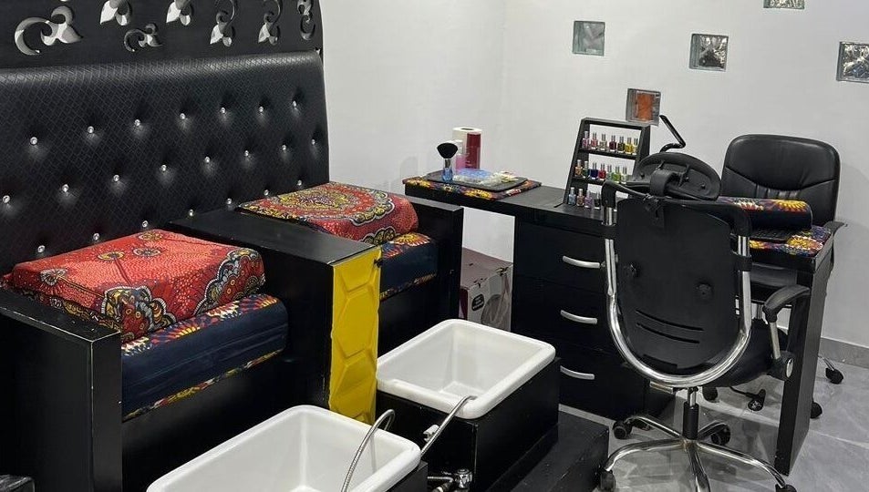Luxury pedicure setup at ErojaHive, Lagos, Lagos, NG, featuring plush seating and elegant decor.