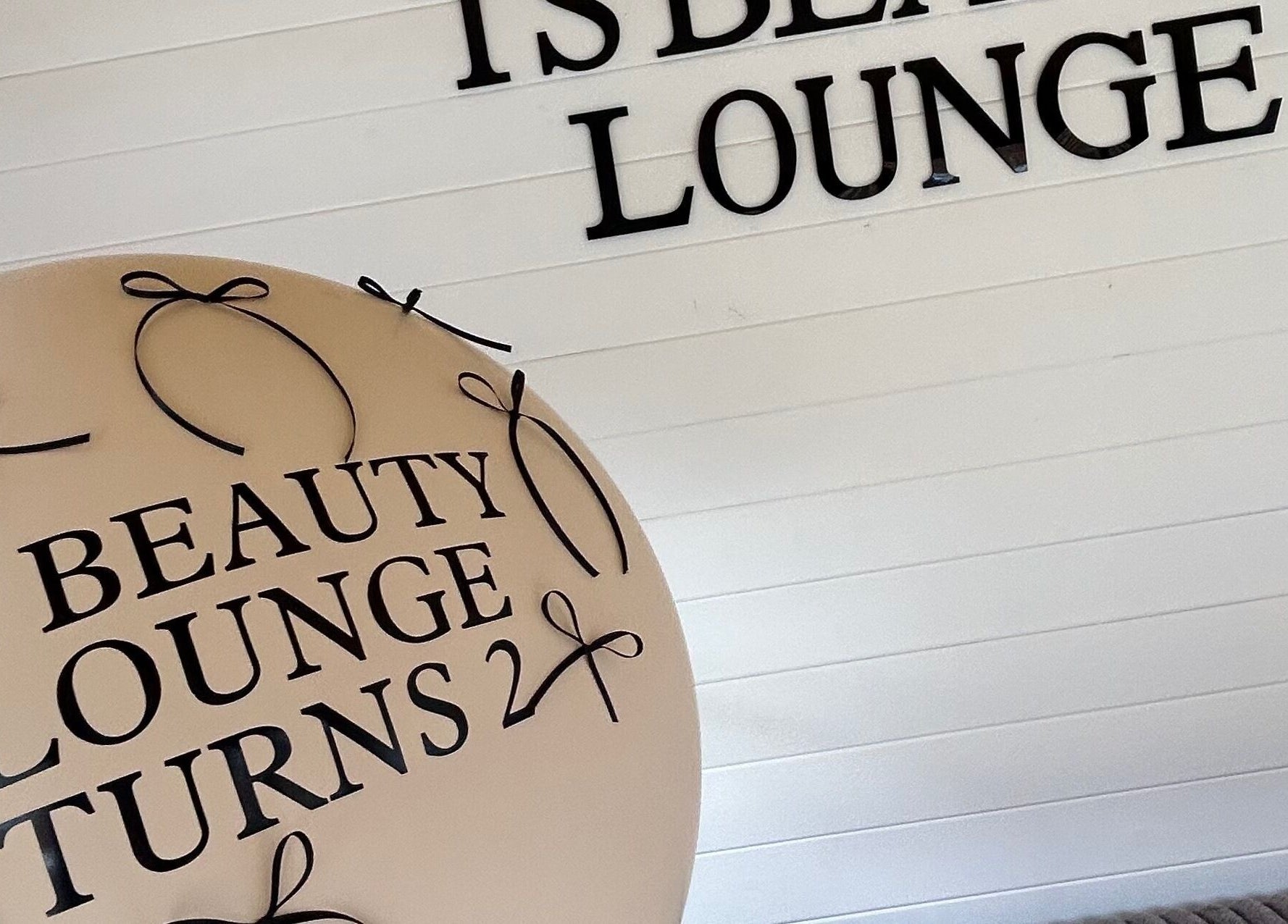 A stylish decor display at Ts Beauty Lounge in Essex, England, GB, celebrating an anniversary.