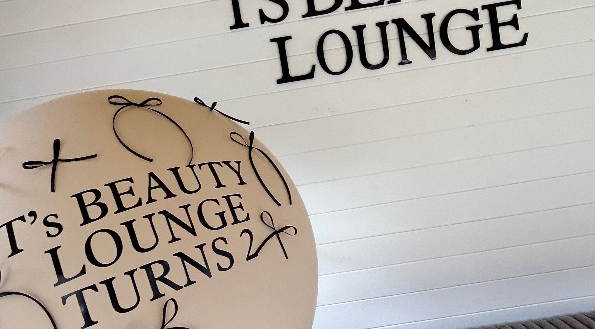 A stylish decor display at Ts Beauty Lounge in Essex, England, GB, celebrating an anniversary.