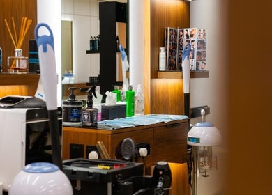 Modern barber station at Dazzle Code Barber in الرياض, منطقة الرياض, SA with grooming products and tools.