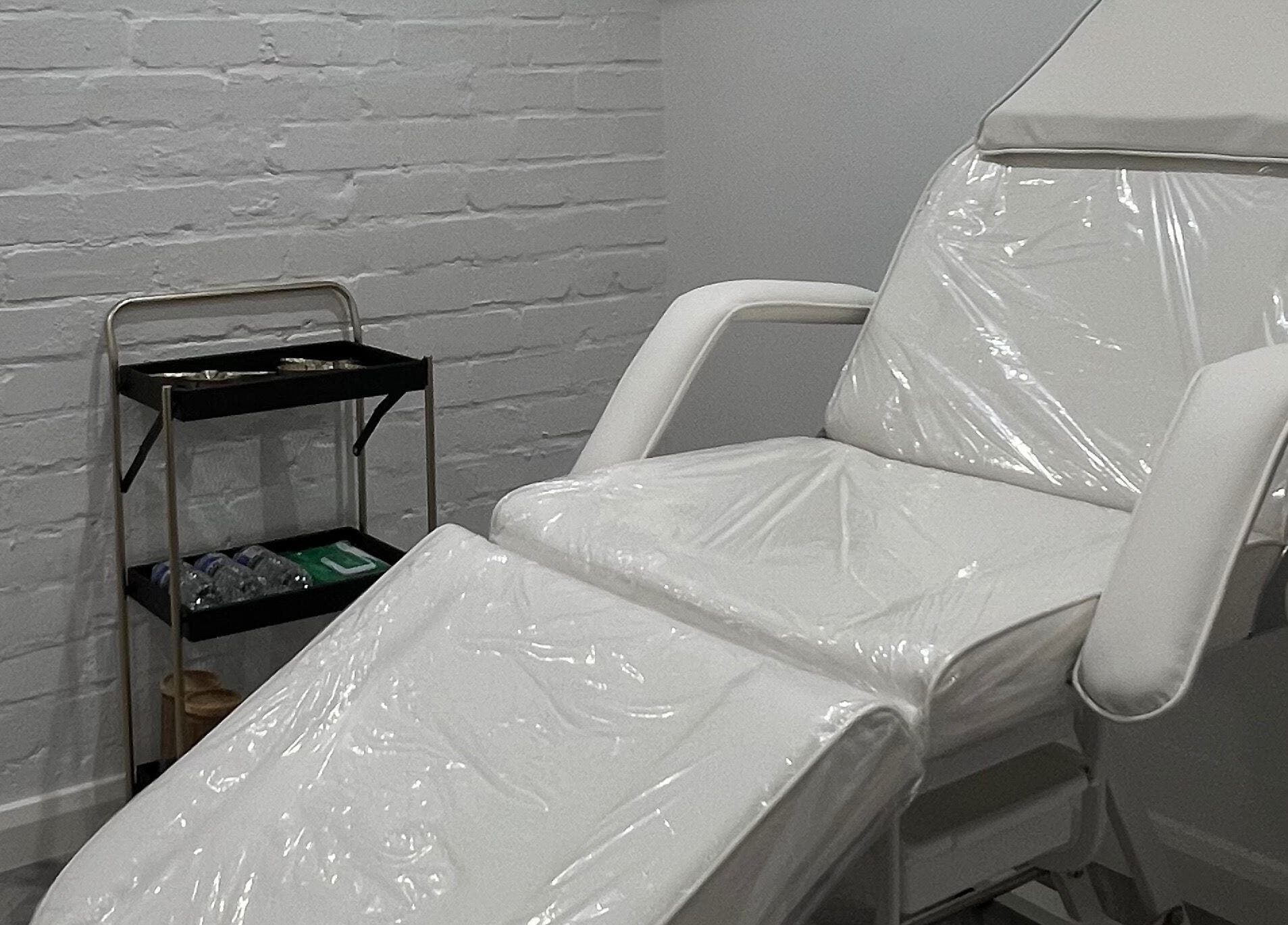 Comfortable treatment chair at RefineMed Aesthetics, Newcastle upon Tyne, England, GB for premium care.