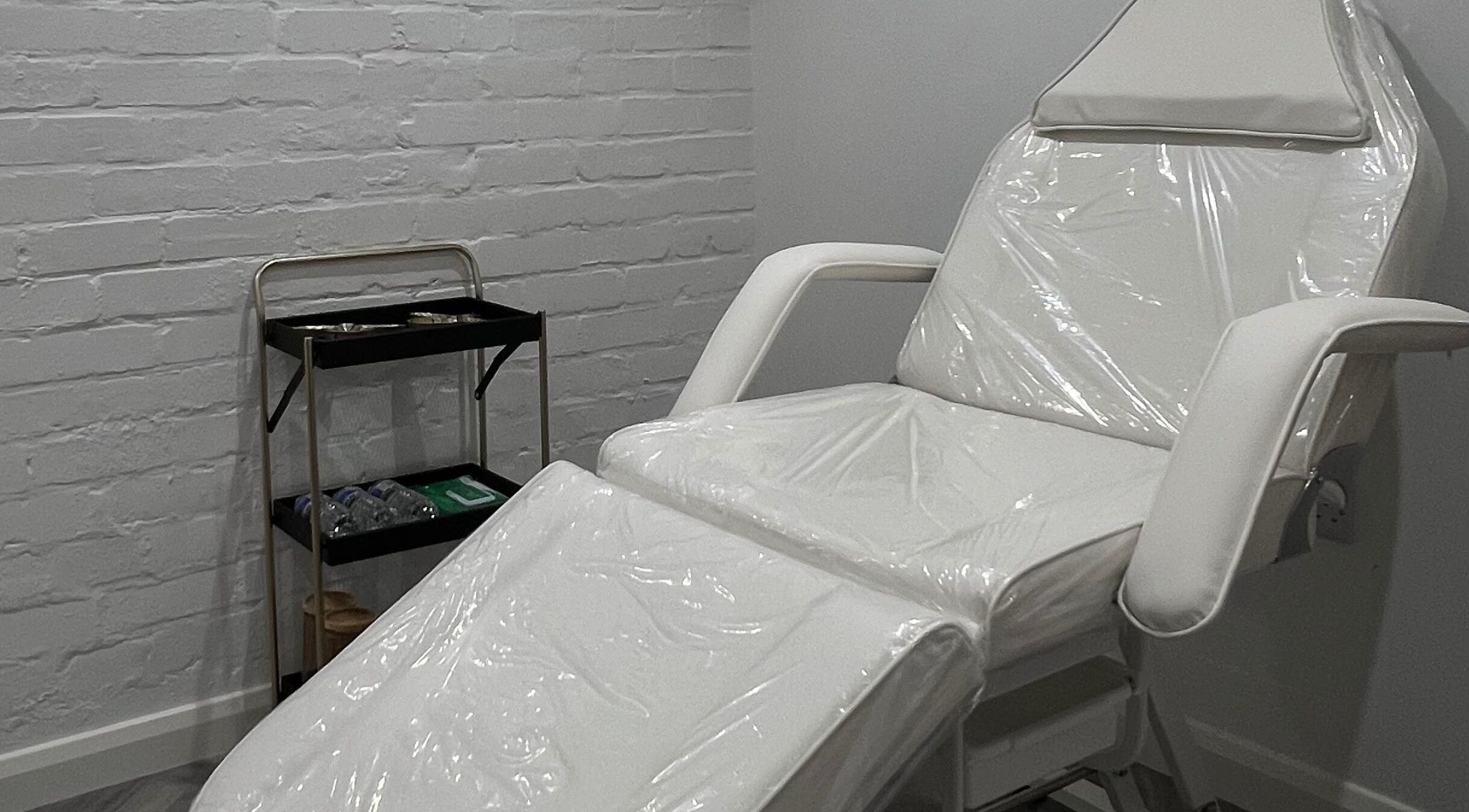 Comfortable treatment chair at RefineMed Aesthetics, Newcastle upon Tyne, England, GB for premium care.