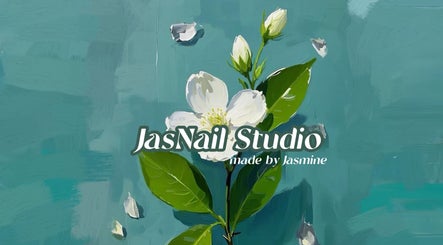 Elegant floral design at JasNail Studio, Halifax, Nova Scotia, CA, featuring white blossoms on a teal background.