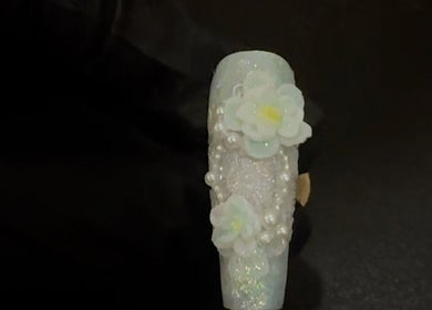 Elegant floral nail art at JasNail Studio in Halifax, Nova Scotia, CA, showcasing intricate flower designs.