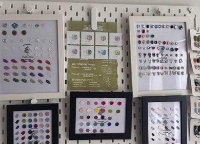 Colorful nail art display at JasNail Studio, Halifax, Nova Scotia, CA showcasing diverse designs.