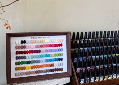 Variety of nail polishes at JasNail Studio in Halifax, Nova Scotia, CA displayed in vibrant rows.