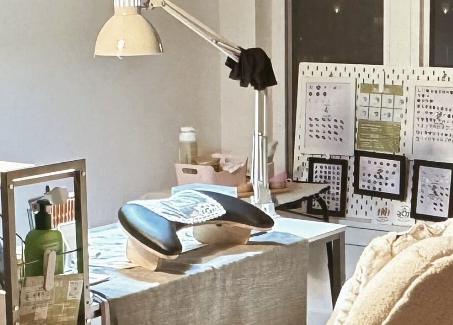 Nail workstation at JasNail Studio, Halifax, Nova Scotia, CA, showcasing tools and a relaxing chair.