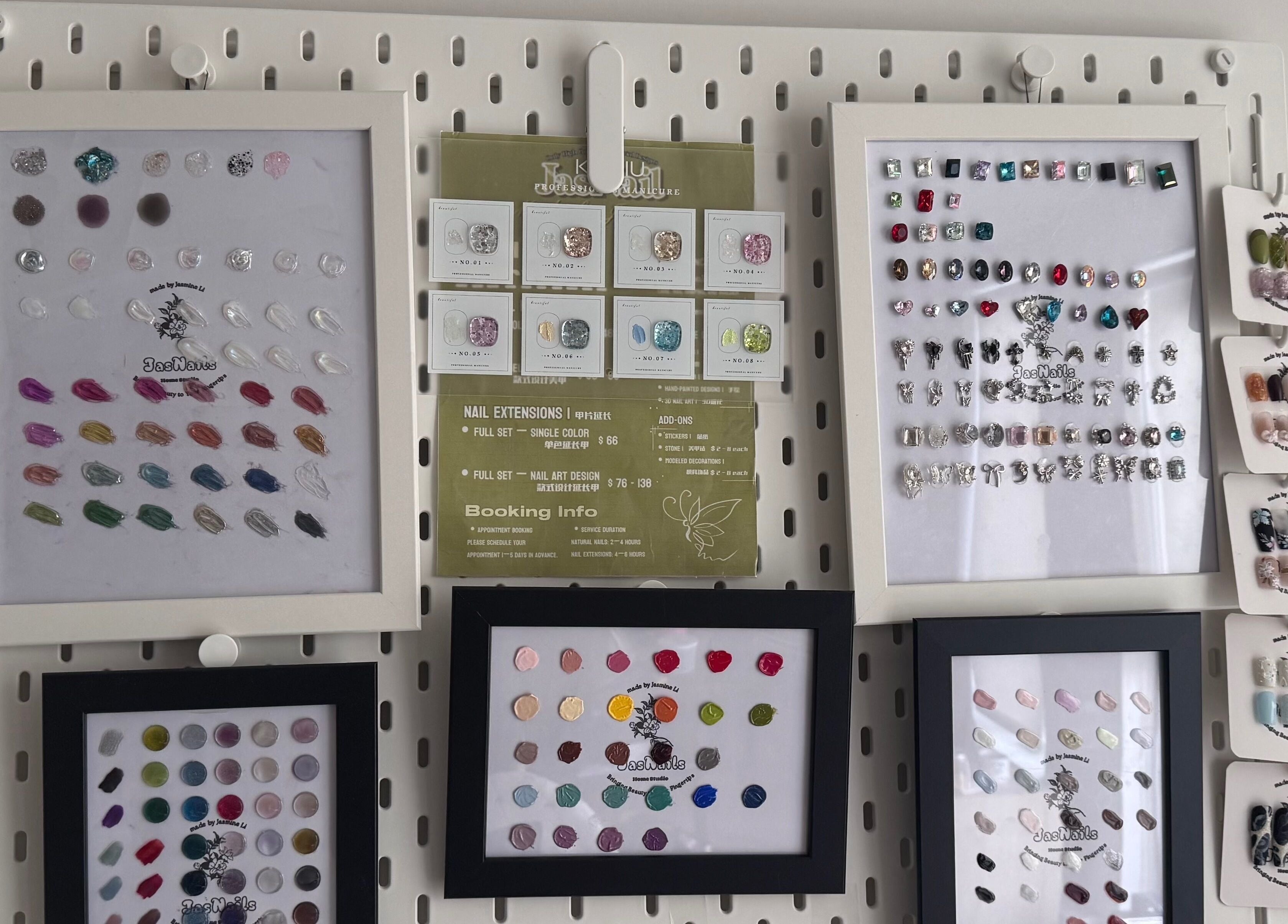 Colorful nail polish and art designs displayed at JasNail Studio, Halifax, Nova Scotia, CA.