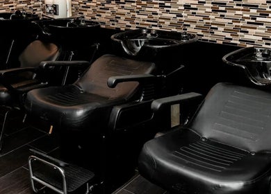 Luxurious salon chairs at Glamour on Fifth Ave, New York, New York, US offer a premium spa experience.