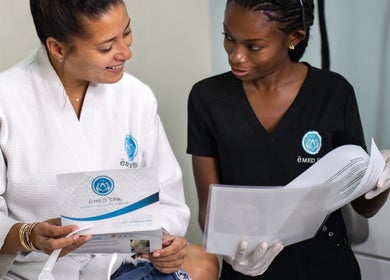 ëMed Spa Jamaica LLC client consults with staff in Kingston, St. Andrew Parish, JM.