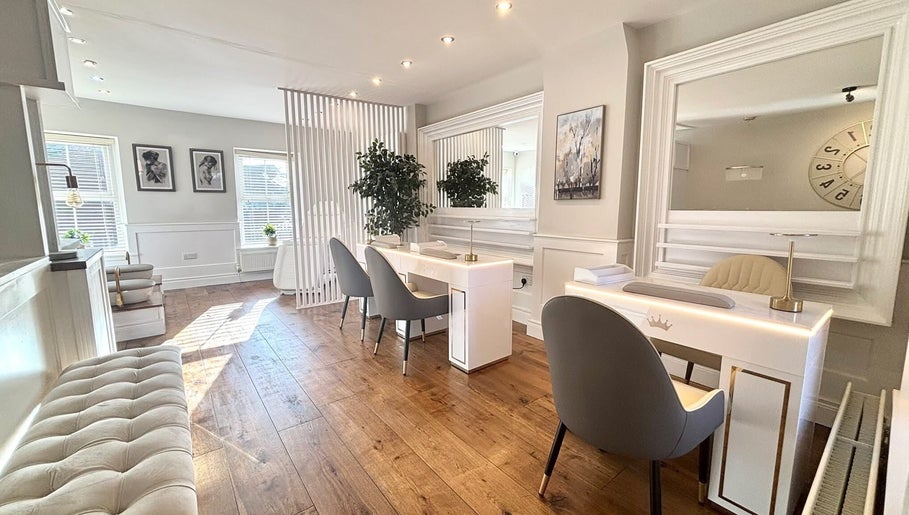 Sleek salon interior at Amt Hair & Extensions, Ballymena, Northern Ireland, GB featuring elegant workstations.