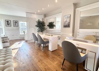 Sleek salon interior at Amt Hair & Extensions, Ballymena, Northern Ireland, GB featuring elegant workstations.