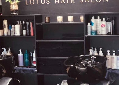 Chic wash station at Lotus Hair Salon, Camberwell, Victoria, AU, showcasing premium hair products.