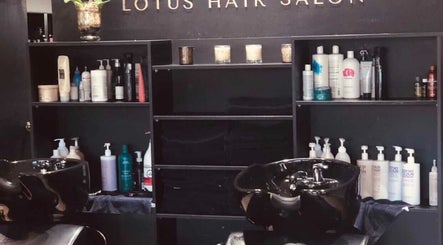 Chic wash station at Lotus Hair Salon, Camberwell, Victoria, AU, showcasing premium hair products.