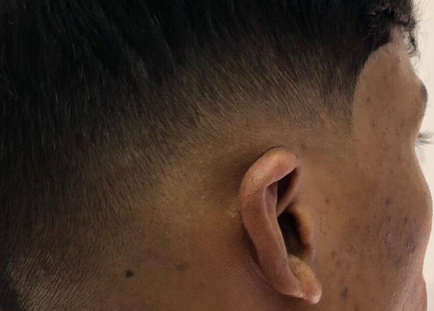 Corte fade en 88BarberPro, Medellín, Antioquia, CO, resaltando el detalle y estilo profesional del servicio.