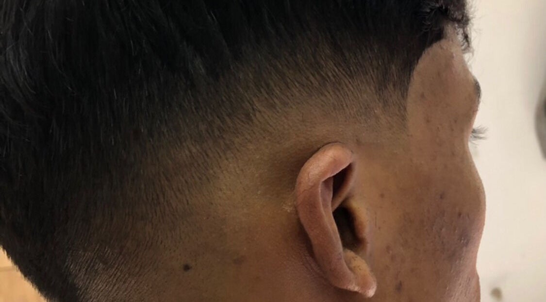 Corte fade en 88BarberPro, Medellín, Antioquia, CO, resaltando el detalle y estilo profesional del servicio.